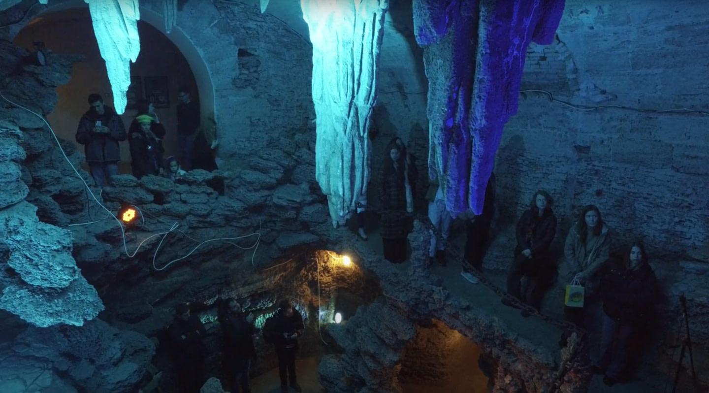 Spectators in the grotto watching Siren's performance